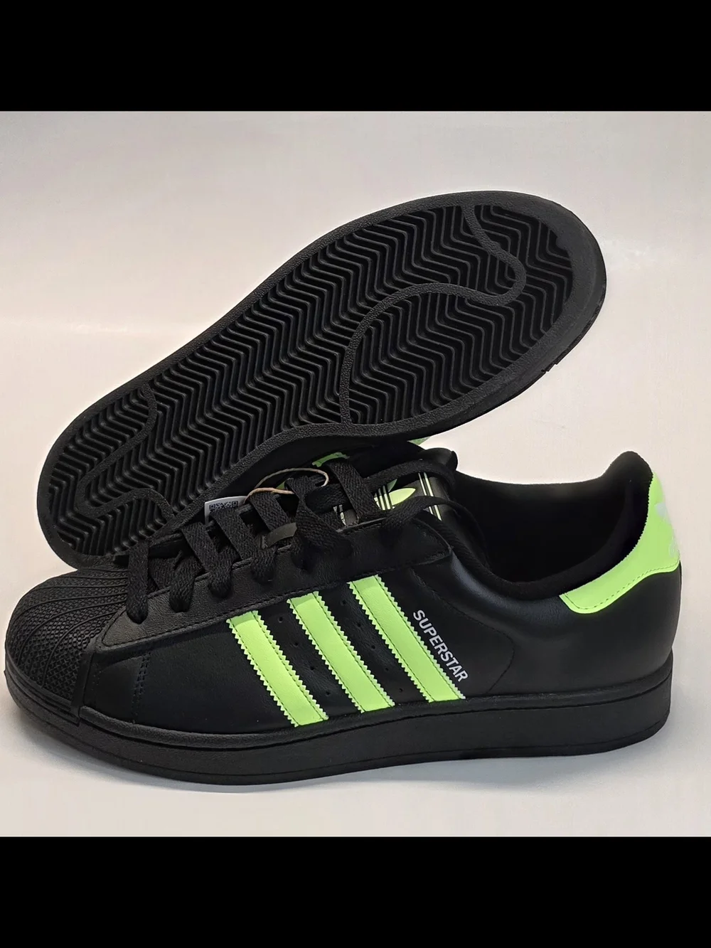 adidas Men’s Black Sneakers with Neon Green Stripes